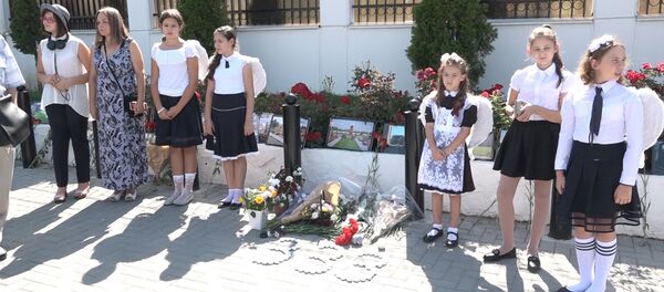 В Кишиневе вспоминают о жертвах теракта в Беслане В Кишиневе вспоминают о жертвах теракта в Беслане - Sputnik Молдова