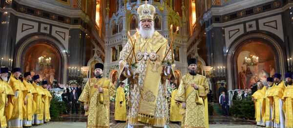 Патриарх Московский и всея Руси Кирилл на Рождественском богослужении в храме Христа Спасителя в Москве - Sputnik Moldova