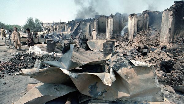 Торговая улица, сожжённая и разграбленная душманами, г. Кундуз. Архив - Sputnik Молдова