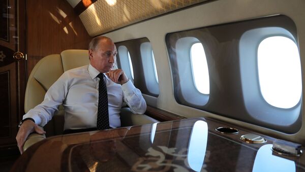 Putin la bordul avionului prezidențial - Sputnik Молдова