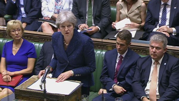 In this image from TV, Britain's Prime Minister Theresa May gives a statement to parliament Monday July 9, 2018. - Sputnik Moldova
