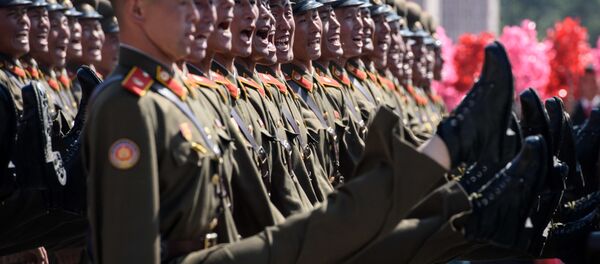 Participanții la parada de aniversare a 70 de ani de la crearea Republicii Populare Democratice Coreene - Sputnik Moldova-România