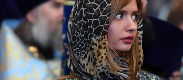 Прихожанка на торжественной церемонии встречи мощей святителя Спиридона Тримифунтского, доставленных в Россию с греческого острова Корфу, в Храме Христа Спасителя - Sputnik Молдова