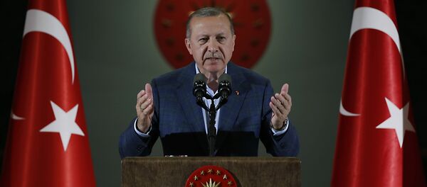 Turkey's President Recep Tayyip Erdogan speaks during an Iftar, the evening meal breaking the Ramadan fast, at his palace in Ankara, Turkey, Saturday, May 19, 2018 - Sputnik Moldova-România