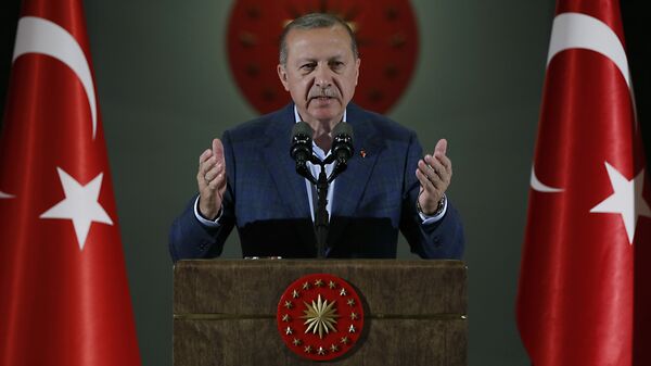 Turkey's President Recep Tayyip Erdogan speaks during an Iftar, the evening meal breaking the Ramadan fast, at his palace in Ankara, Turkey, Saturday, May 19, 2018 - Sputnik Moldova-România