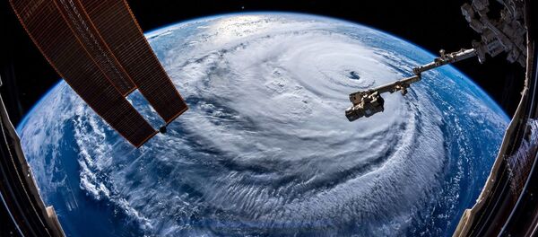 Ураган Флоренс, сфотографированный астронавтом Александром Герстом с МКС - Sputnik Молдова