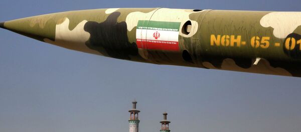 A missile is displayed at an exhibition on the 1980-88 Iran-Iraq war, at a park, northern Tehran, Iran, Thursday, Sept. 25, 2014 - Sputnik Moldova-România