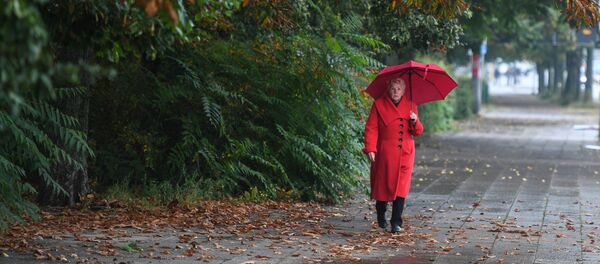 Женщина во время дождя - Sputnik Молдова