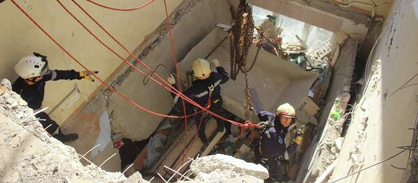 Работа спасателей на месте взрыва в многоэтажке в Кишиневе Работа спасателей на месте взрыва в многоэтажке в Кишиневе - Sputnik Молдова