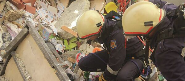 Работа спасателей на месте взрыва в многоэтажке в Кишиневе - Sputnik Молдова