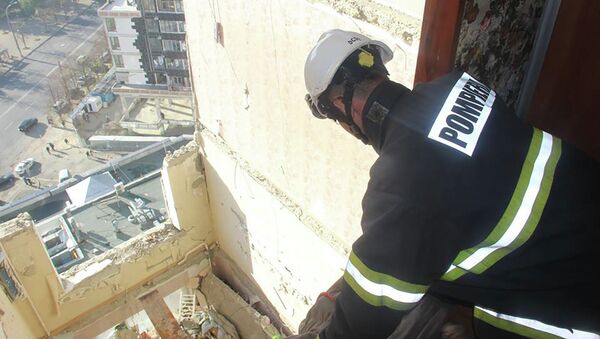 Работа спасателей на месте взрыва в многоэтажке в Кишиневе - Sputnik Moldova