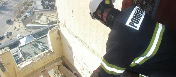 Работа спасателей на месте взрыва в многоэтажке в Кишиневе - Sputnik Молдова