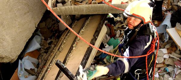 Работа спасателей на месте взрыва в многоэтажке в Кишиневе - Sputnik Moldova