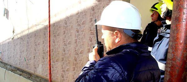 Работа спасателей на месте взрыва в многоэтажке в Кишиневе - Sputnik Молдова