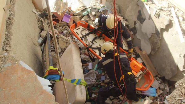 Работа спасателей на месте взрыва в многоэтажке в Кишиневе - Sputnik Молдова