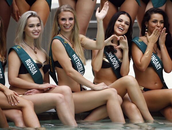 Идеальные формы и хорошее настроение: кандидатки на звание Мисс Земля-2018. - Sputnik Молдова