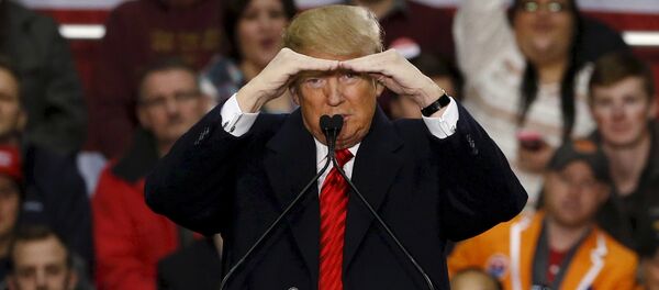 Republican U.S. presidential candidate Donald Trump looks to the cameras at the back of the arena during a rally at Clemson University - Sputnik Moldova