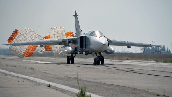 Russia's Su-24 bomber lands at the Hmeymim air base in Latakia, Syria. File photo - Sputnik Moldova-România