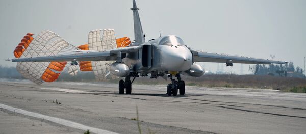 Russia's Su-24 bomber lands at the Hmeymim air base in Latakia, Syria. File photo - Sputnik Moldova-România