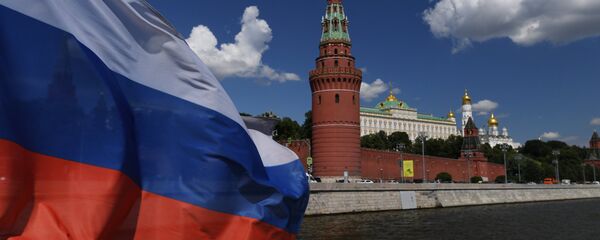 Le Kremlin de Moscou et le drapeau russe Le Kremlin de Moscou et le drapeau russe - Sputnik Moldova