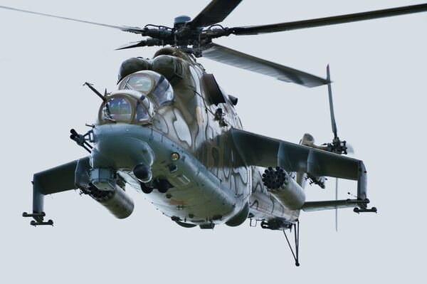 Вертолет Ми-24 на совместном военном антитеррористическом учении вооруженных сил государств – членов ШОС Мирная миссия – 2018 над полигоном в Чебаркуле - Sputnik Молдова