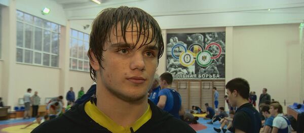 Борец греко-римского стиля Александрин Гуцу, победивший на юношеской Олимпиаде 2018 года в Буэнос-Айресе Борец греко-римского стиля Александрин Гуцу, победивший на юношеской Олимпиаде 2018 года в Буэнос-Айресе - Sputnik Молдова