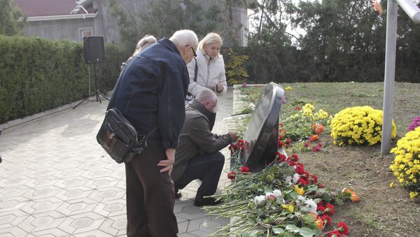 Церемония перезахоронения останков жертв политических репрессий. - Sputnik Молдова