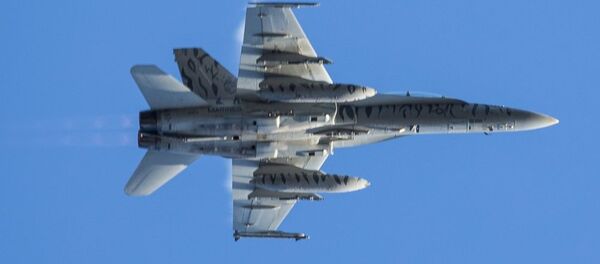 Американский истребитель F-18 во время совместных учений войск НАТО Trident Juncture 2018 (Единый трезубец) в Норвегии - Sputnik Moldova-România