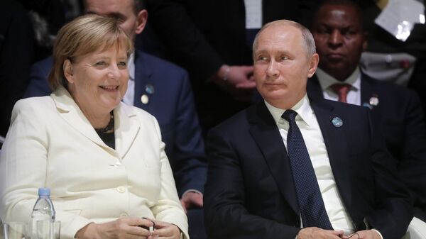 Putin și Merkel, la Forumul Păcii - Sputnik Moldova