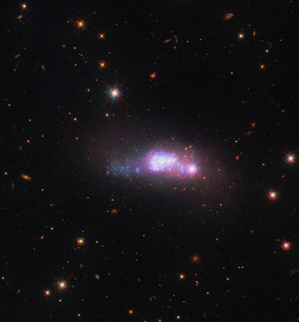 Galaxia pitic ESO 338-4, care se află în constelația Coroanei de Sud - Sputnik Moldova