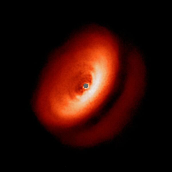 Пылевой диск вокруг молодой звезды IM Lupi  - Sputnik Молдова