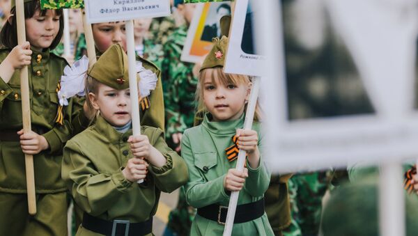 Участники акции Бессмертный полк, проходящего в рамках детского парада Победы «Дорогами памяти» в Иванове - Sputnik Moldova