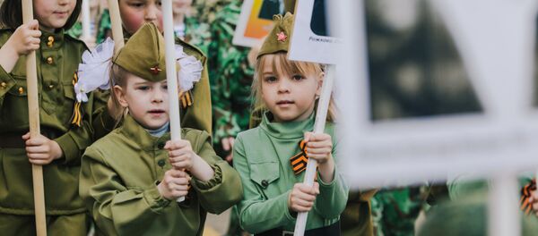 Участники акции Бессмертный полк, проходящего в рамках детского парада Победы «Дорогами памяти» в Иванове - Sputnik Moldova