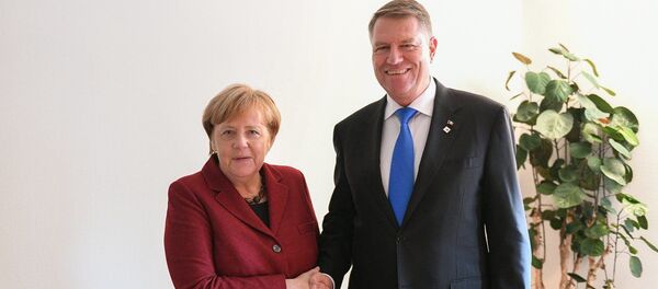 Angela Merkel și Klaus Iohannis Angela Merkel și Klaus Iohannis - Sputnik Moldova-România