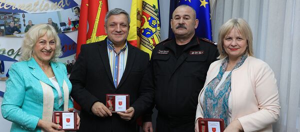 Decernarea Medaliei ”Pentru cooperare” Gutierei Prodan și lui Andrei Porubin - Sputnik Молдова
