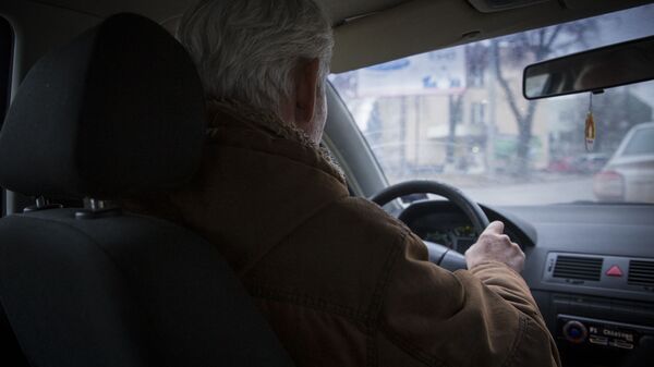 Водитель за рулем авто, архивное фото.  - Sputnik Молдова