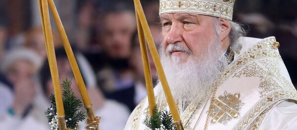 Патриарх Московский и всея Руси Кирилл во время Рождественского богослужения в храме Христа Спасителя в Москве - Sputnik Moldova