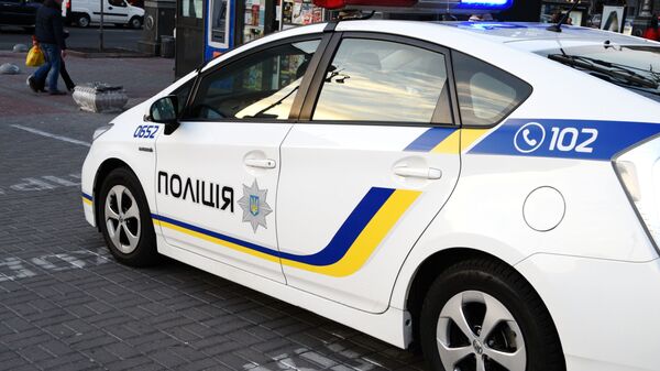 Автомобиль сотрудников Украинской полиции в Киеве - Sputnik Moldova-România