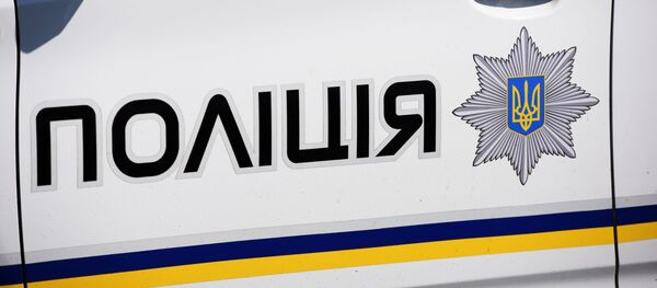 Автомобиль сотрудников Украинской полиции в Киеве - Sputnik Молдова