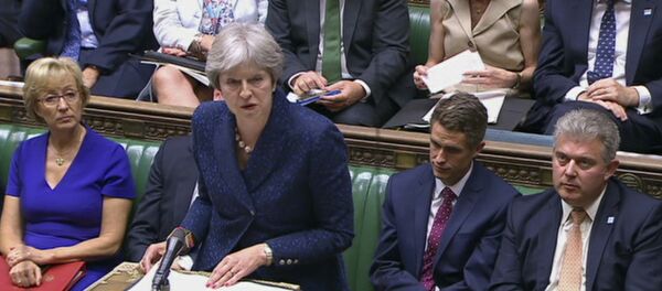 In this image from TV, Britain's Prime Minister Theresa May gives a statement to parliament Monday July 9, 2018. - Sputnik Moldova