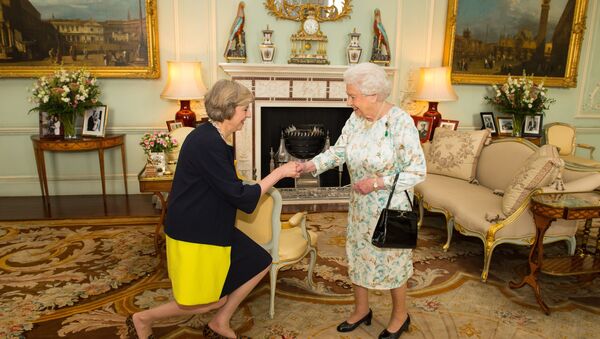 Queen Elizabeth II welcomes Theresa May, left, at the start of an audience in Buckingham Palace, London, where she invited the former Home Secretary to become Prime Minister and form a new government, Wednesday July 13, 2016 - Sputnik Moldova