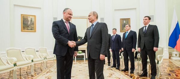 Президент Молдовы Игорь Додон и российский лидер Владимир Путин Президент Молдовы Игорь Додон и российский лидер Владимир Путин - Sputnik Молдова
