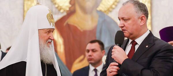 Патриарх Кирилл и Игорь Додон Патриарх Кирилл и Игорь Додон - Sputnik Молдова