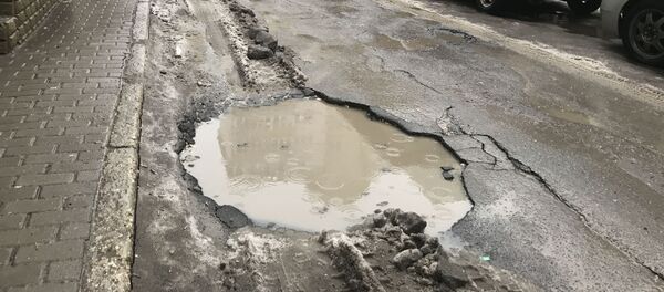 Разбитые улицы Кишинева - Sputnik Молдова