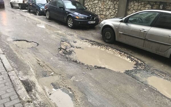 Разбитые улицы Кишинева - Sputnik Молдова