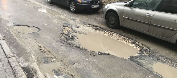 Разбитые улицы Кишинева - Sputnik Молдова