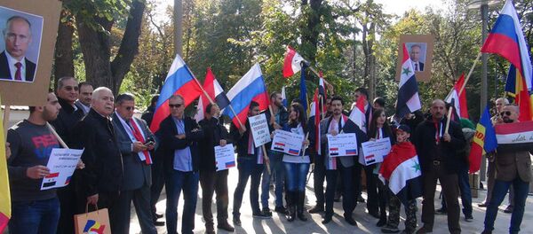Митинг в поддержку действий России в Сирии в Бухаресте - Sputnik Молдова