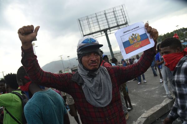 Protestatarii opoziției din Haiti cer intervenția Rusiei Protestatarii opoziției din Haiti cer intervenția Rusiei - Sputnik Moldova-România