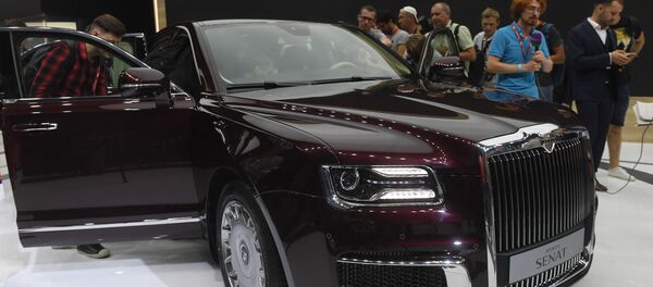 Журналисты на презентации автомобиля Aurus Senat на Московском международном автомобильном салоне 2018 - Sputnik Moldova