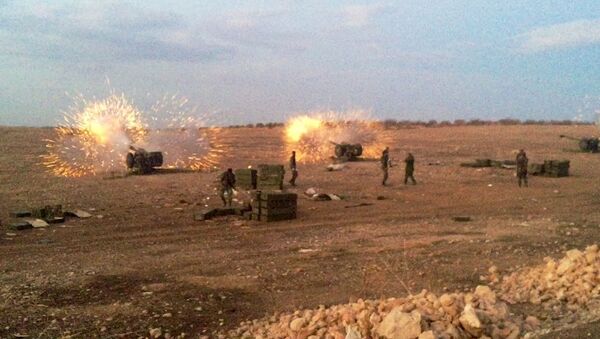 Сирийская артиллерия против боевиков ИГ на севере провинции Хама - Sputnik Молдова